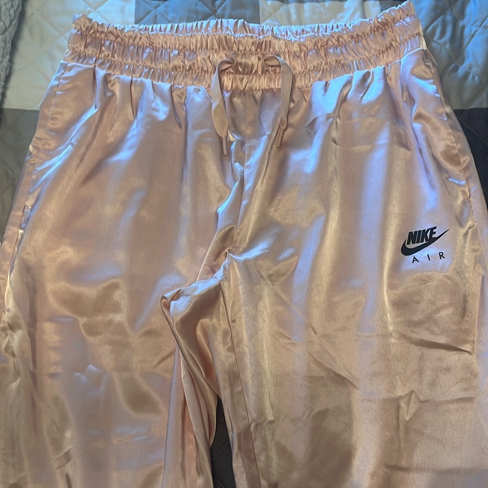 Pink silky Nike pants